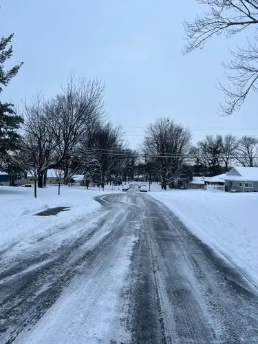 Crisp winter air blankets the sleepy street.